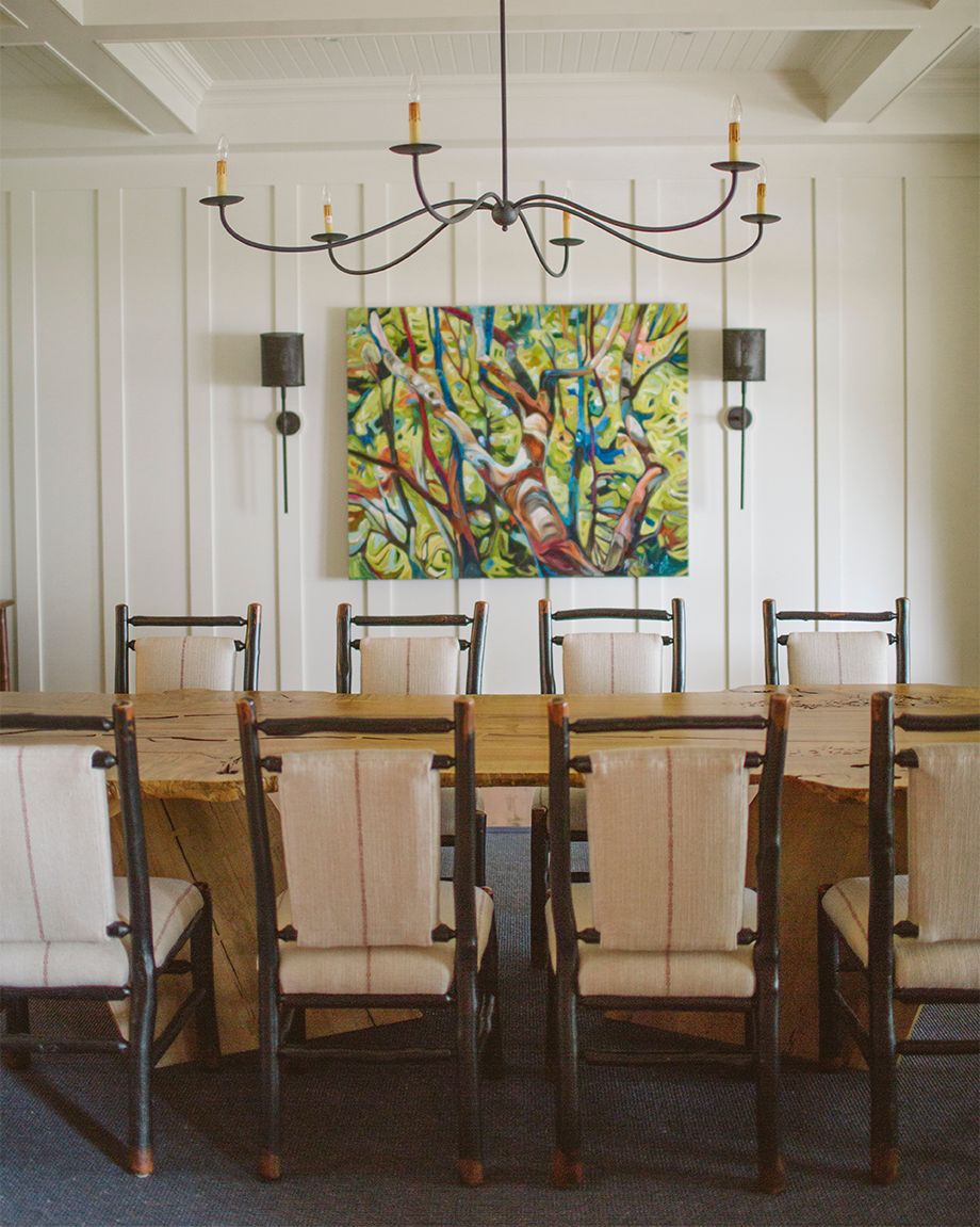 endless summer - dining room table with artwork and chairs
