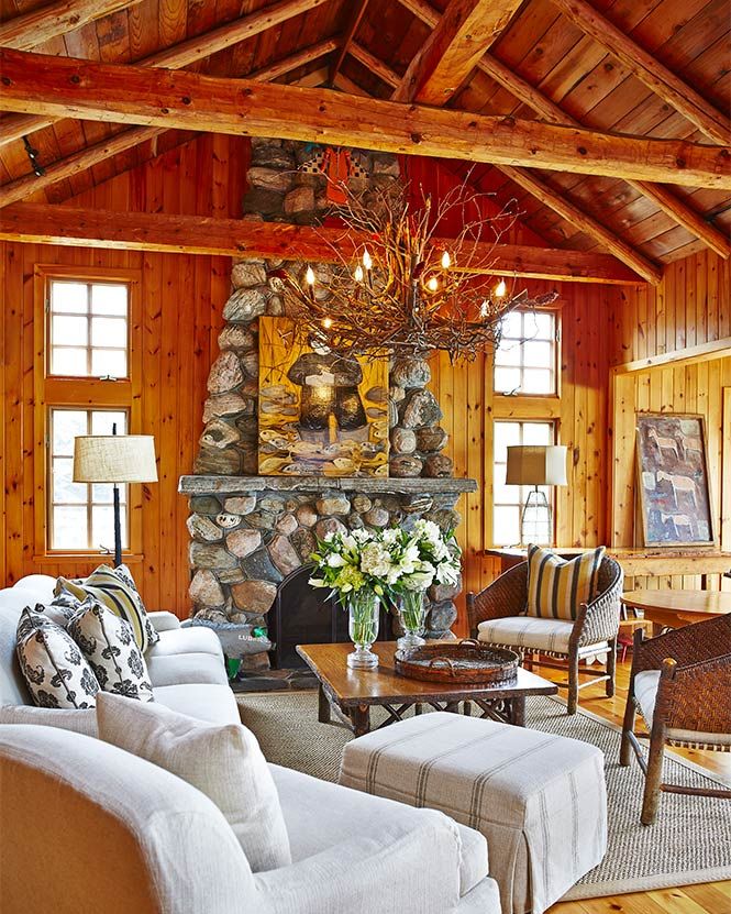 Great room with vaulted ceiling, fireplace and exposed timbers