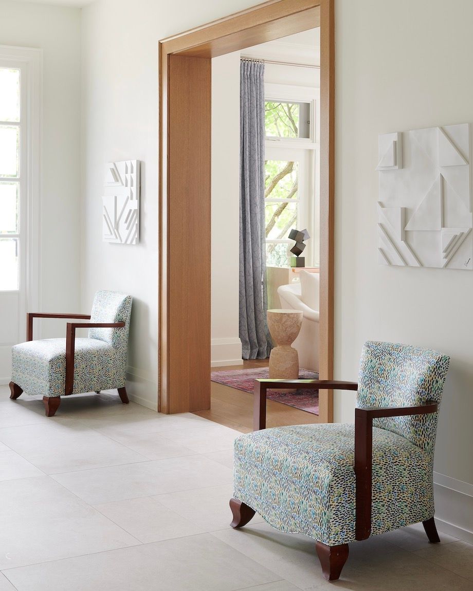 hallway entrance with decorative chairs 