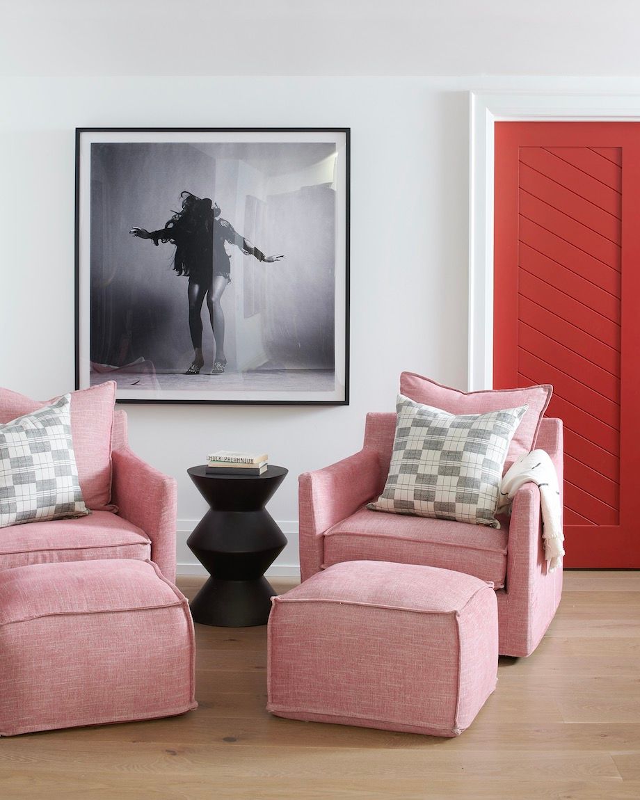 pink accent chairs and modern decor 